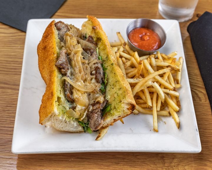 TruFire signature dishes Honey BurrataRibeye SandwichAkaushi Burger